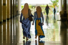 Muslim Girls Walking in a Mosque