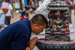 Praying at Swayambhunath Temple