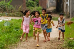 Children Smiling and Running