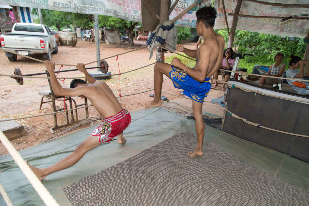 muay thai fighters stretching