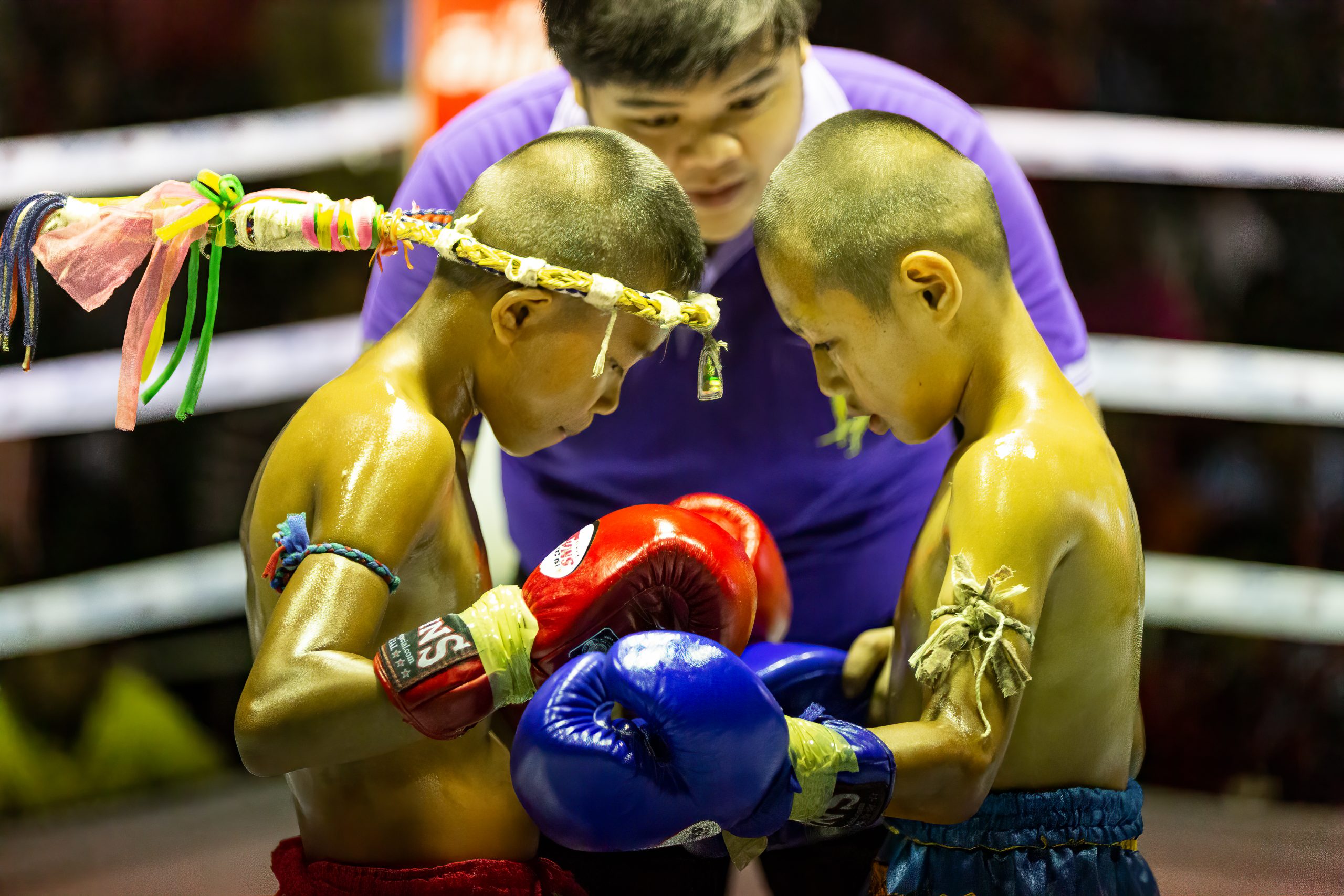 children muay thai fighters praying