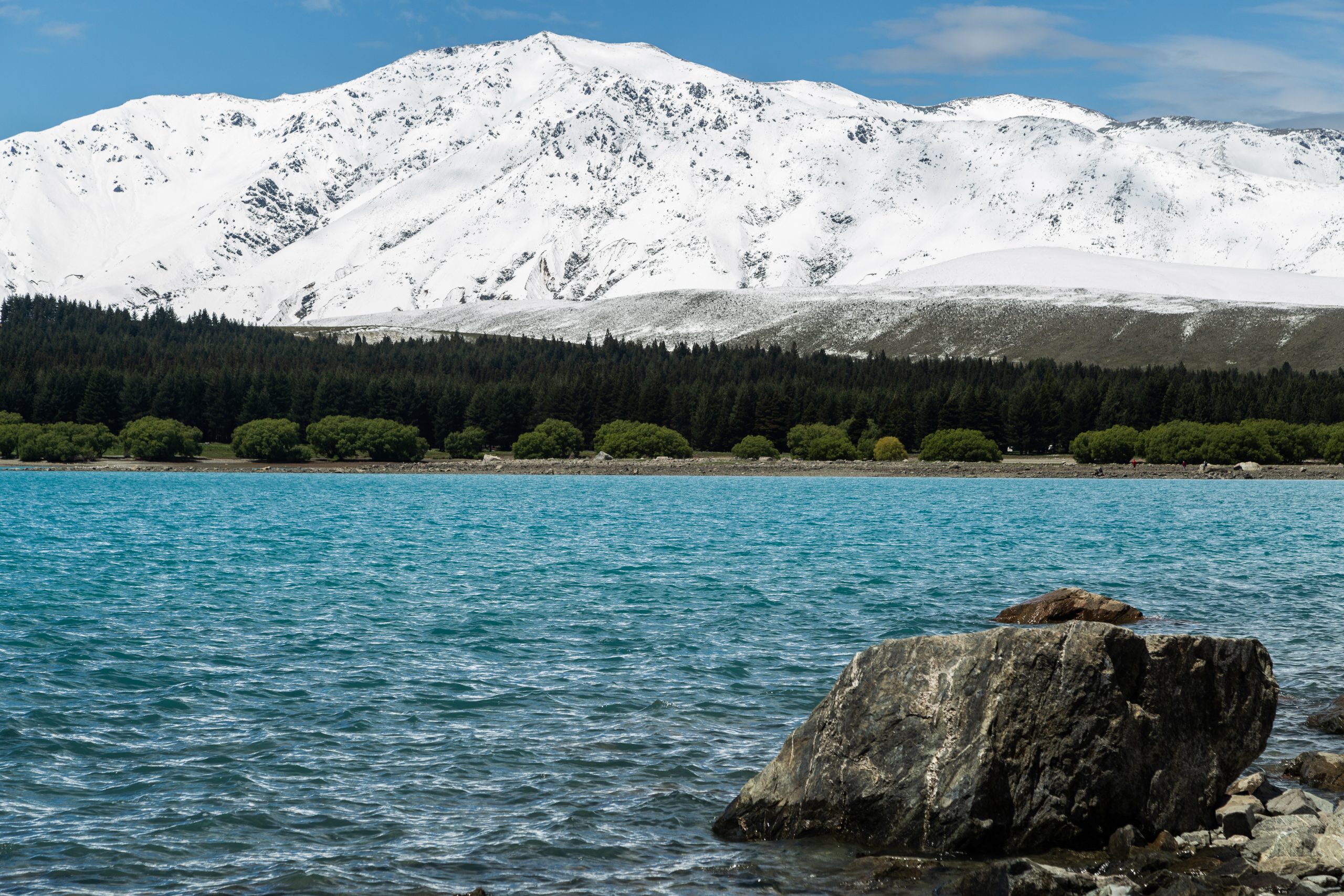 Glacier behind turquoise lake